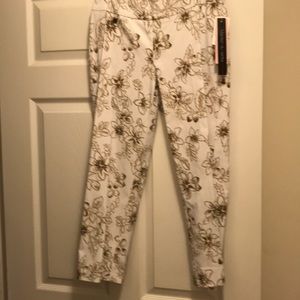 White and brown capris.